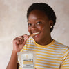 Woman eating a piece of brittle